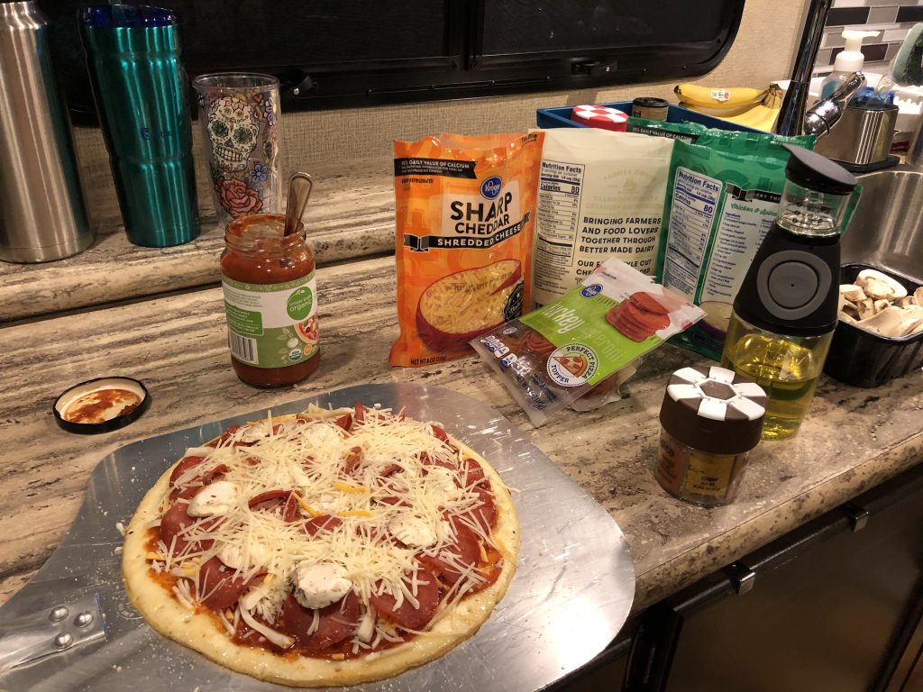 Grill Pizza during Camping Trip